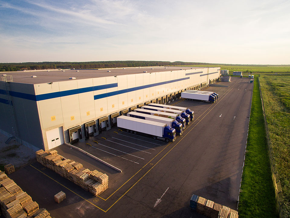 Trucks outside a warehouse